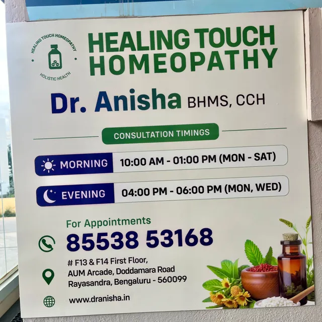 Healing Touch Homeopathy wall signage with consultation timings